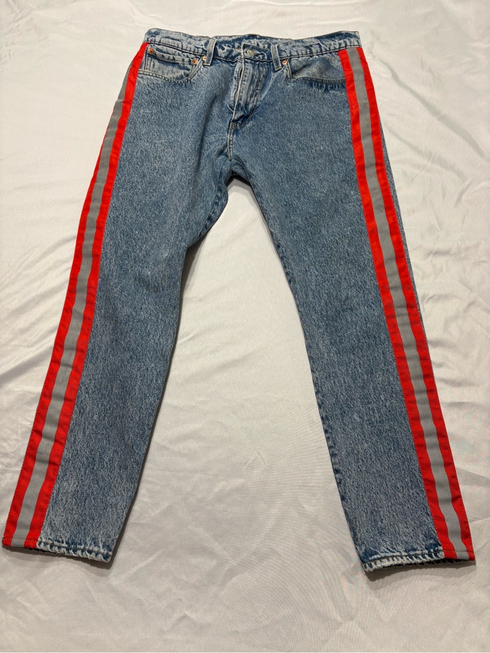 Levi's Light Blue Denim Jeans with Red Side Stripes